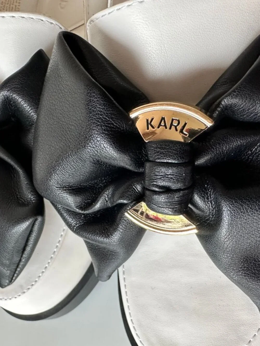 KARL LAGERFELD PARIS Camilia Fan Bow White Loafers With Black Bow Shoes Size 7.5